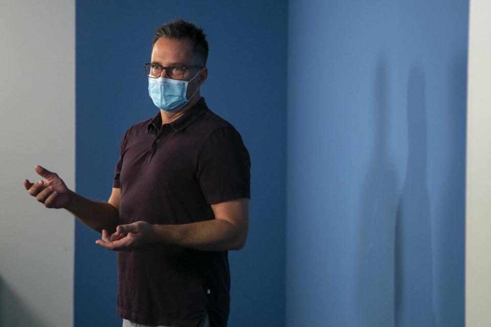 Casting director Ross Lacy wears a mask as he prepares for in-person auditions.