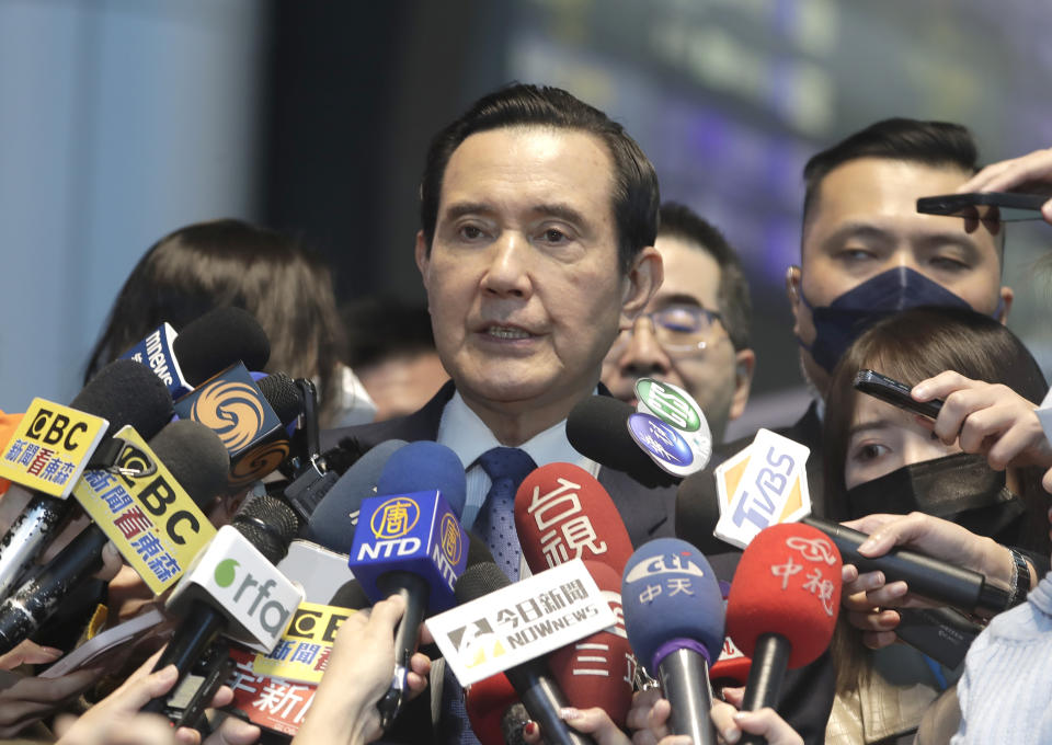 Former Taiwan President Ma Ying-jeou answers to press before leaving for China at Taoyuan International Airport in Taoyuan City, Northern Taiwan, Monday, March 27, 2023. Ma departed for China Monday on a 12-day tour, a day after Taiwan lost another one of its diplomatic allies to China. (AP Photo/Chiang Ying-ying)