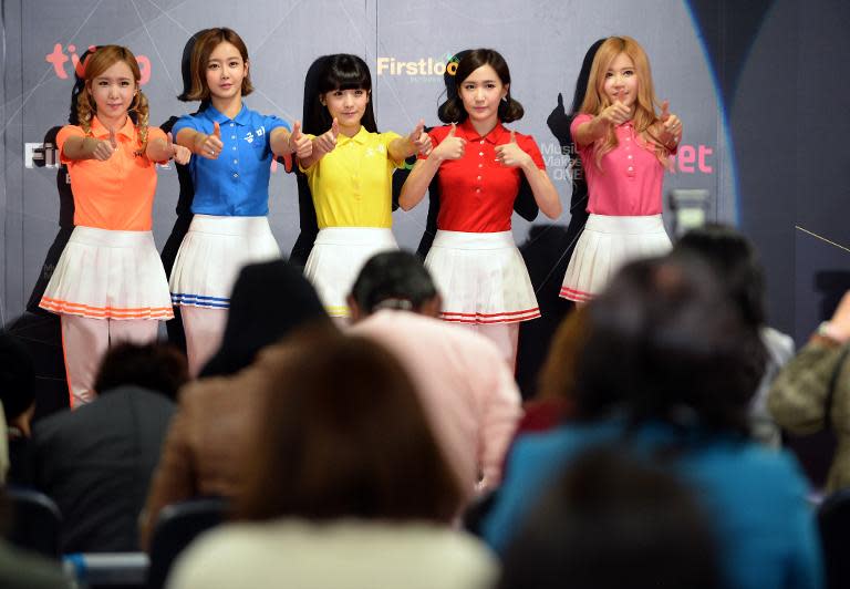 Members of South Korean K-Pop group "Crayon Pop" pose during a press conference prior to attending the K-Pop chart show "M Countdown" at Yokohama Arena on April 2, 2014