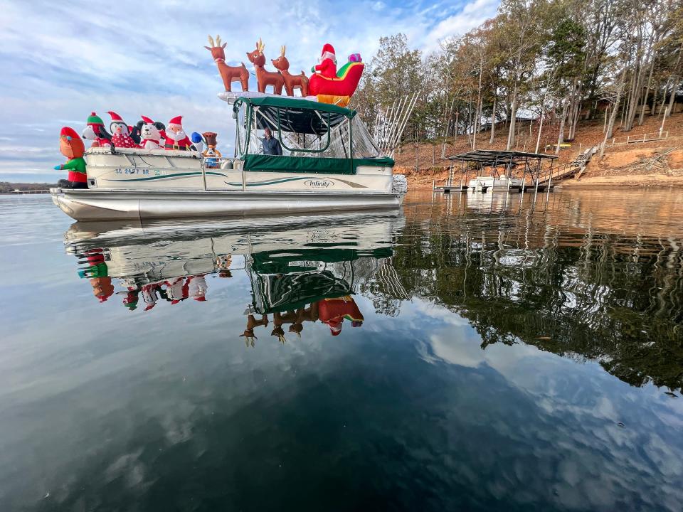 Ronnie Ashmore of Anderson, SC prepares his boat with Christmas decorations for 8th annual Western Carolina Sailing Club's Parade of Lights on Lake Hartwell, while at his home Tuesday, November 22, 2022. The event is on Friday, December 2, and also on Saturday, December 3, starting at the Sailing Club at 7 p.m. toward Green Pond Landing, and loop in front of the State Highway 24 double bridges near Portman Marina and back to the sailing club. 