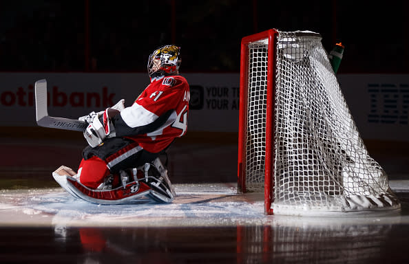 OTTAWA, ON – FEBRUARY 11: Craig Anderson #41 of the Ottawa Senators stretches in his crease during player introductions prior to a game against the New York Islanders at Canadian Tire Centre on February 11, 2017 in Ottawa, Ontario, Canada. (Photo by Andre Ringuette/NHLI via Getty Images)