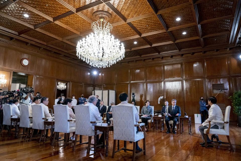 Secretary of State Antony Blinken, at second right, meets with Philippine President Ferdinand Marcos Jr., right, at the Malacanang Palace in Manila, Philippines, Saturday, Aug. 6, 2022. Blinken is on a ten day trip to Cambodia, Philippines, South Africa, Congo, and Rwanda. (AP Photo/Andrew Harnik, Pool)