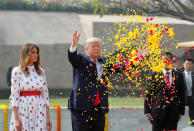 U.S. President Donald Trump and first lady Melania Trump attend a wreath laying ceremony at Mahatma Gandhi's memorial at Raj Ghat in New Delhi, India, February 25, 2020. REUTERS/Al Drago