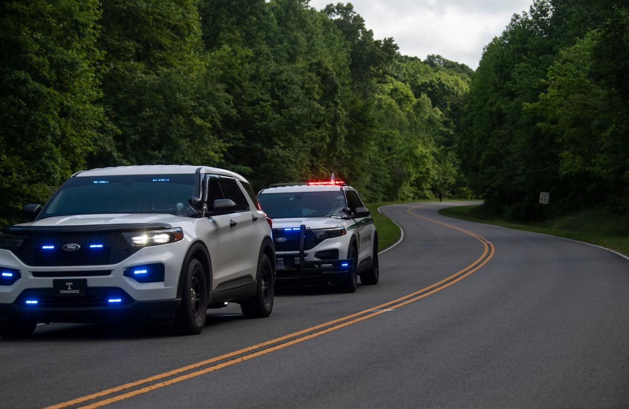 First respondersoff Natchez Trace following a plane crash where three people were killed in Williamson County, Tenn., Wednesday, May 15, 2024. The plane departed from Baton Rouge, Louisiana and was headed to Louisville, Kentucky when it crashed.