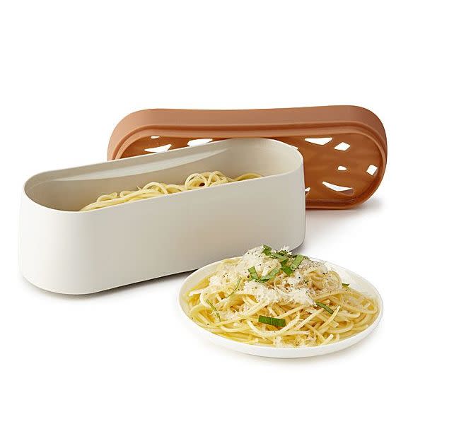 Find this <a href="https://fave.co/3gzn05T" target="_blank" rel="noopener noreferrer">Microwave Pasta Pot for $25</a> which has everything you need to boil, strain and eat pasta at Uncommon Goods.