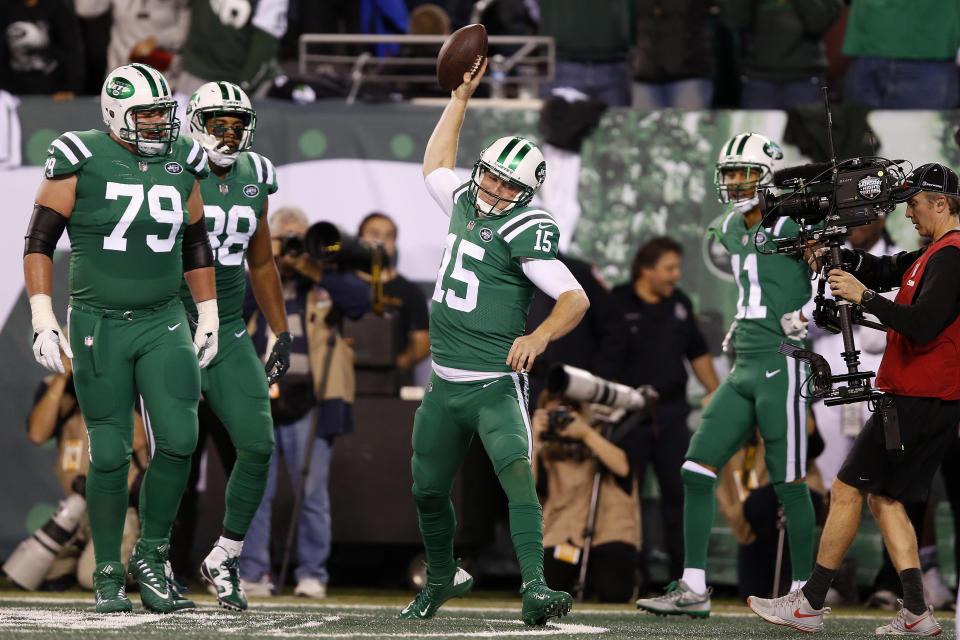 New York Jets quarterback Josh McCown (15) spikes the ball after scoring on a touchdown run against the Buffalo Bills during the first half of an NFL football game, Thursday, Nov. 2, 2017, in East Rutherford, N.J. (AP Photo/Kathy Willens)