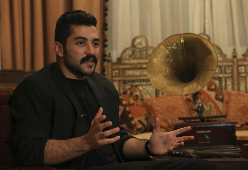 FILE - In this Wednesday, April 27, 2016 file photo, Lebanese Hamed Sinno, lead singer and song writer of the Lebanese group Mashrou' Leila ("Leila's Project") band, speaks during an interview with the Associated Press, in Beirut, Lebanon. A Lebanese band that supports gay rights has found itself at the center of a heated debate in Lebanon about freedom of expression. Church leaders and conservative politicians demand that a concert by Mashrou' Leila in the coastal city of Byblos be canceled, setting off a storm of indignation on social media. (AP Photo/Hussein Malla, File)