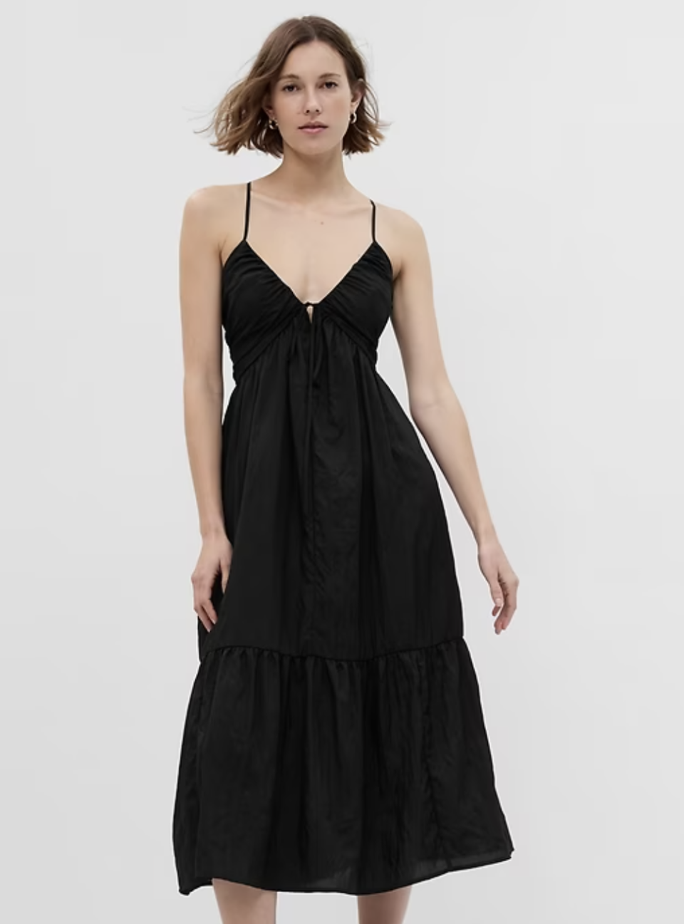 model wearing black Tie-Front Ruffle Hem Maxi Dress (photo via Gap)