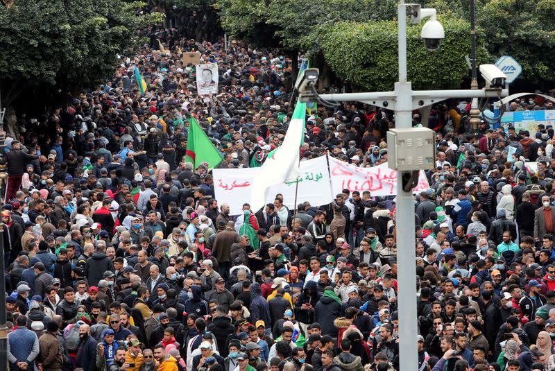FILE PHOTO: Demonstrators take part in a protest in Algiers