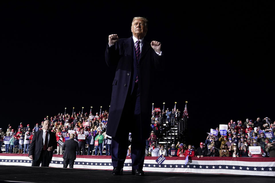 President Donald Trump gestures to the crowd as he finishes speaking at a campaign rally at Bemidji Regional Airport, Friday, Sept. 18, 2020, in Bemidji, Minn.
