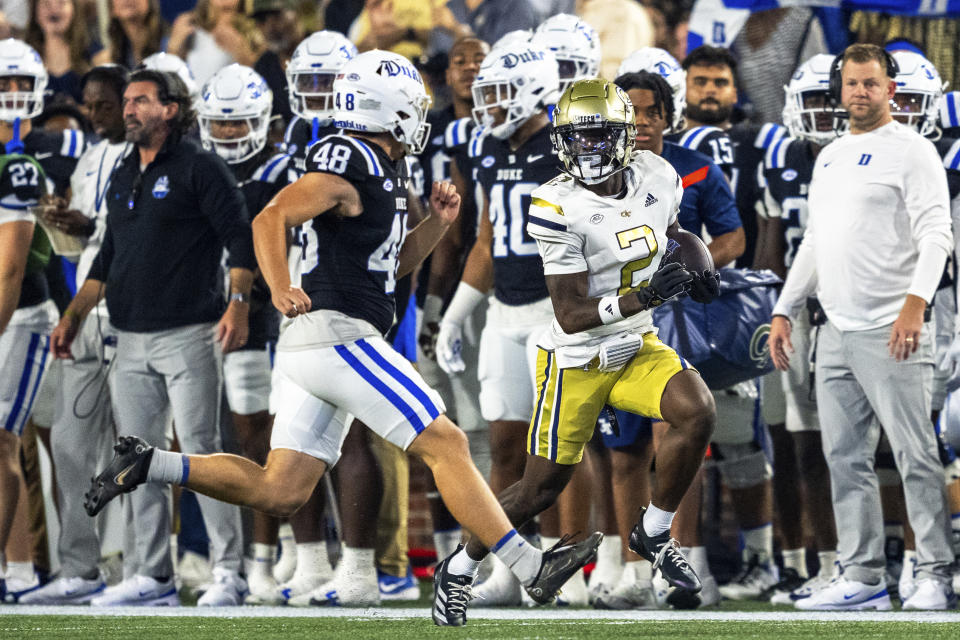 Georgia Tech wide receiver Eric Singleton Jr. (2) runs down the sidelines after a punt return in the first quarter of a football game against the Duke, during an NCAA college football game, Saturday, Oct. 5, 2024, in Atlanta. (AP Photo/Jason Allen)