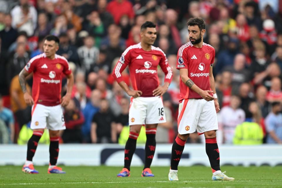 Manchester United players react during the defeat by Liverpool (Getty Images)