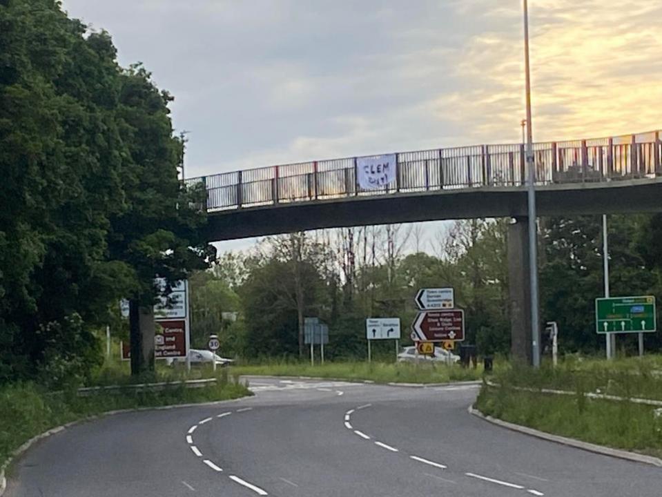 Swindon Advertiser: A 'Clem Out' banner on the White Hart roundabout