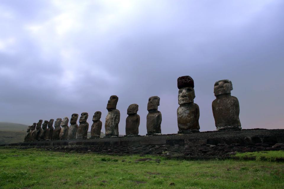 Stone statues of the Rapa Nui culture on the Ahu Tongariki site on Easter Island off the Chilean coast in the Pacific Ocean on August 12, 2013.