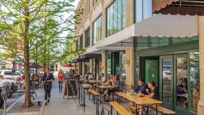 ASHEVILLE, NC, USA-13 MAY 18: Diners relaxing on Page Ave.