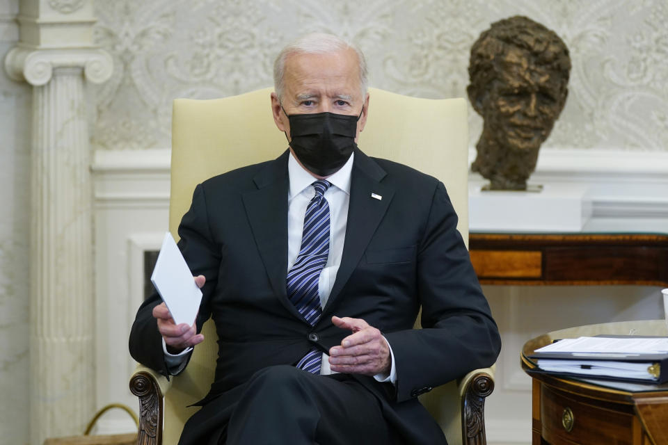 President Joe Biden speaks as he and Vice President Kamala Harris meet with members of the Congressional Black Caucus in the Oval Office of the White House, Tuesday, April 13, 2021, in Washington. (AP Photo/Patrick Semansky)