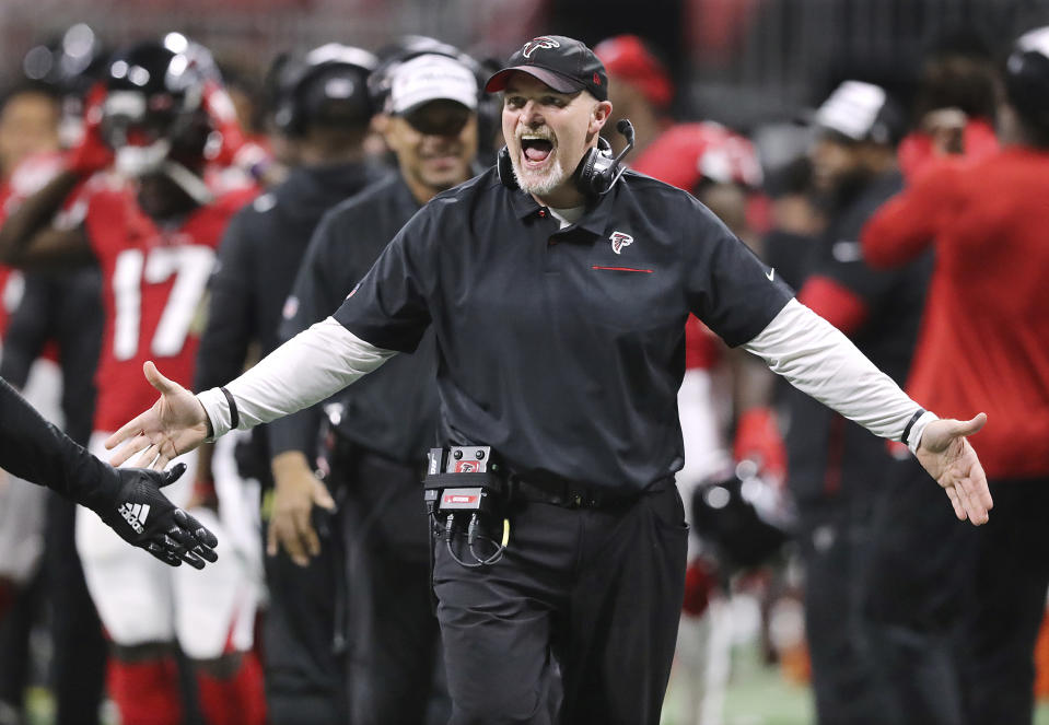 Atlanta Falcons head coach Dan Quinn speaks to players during the first half of an NFL football game against the Jacksonville Jaguars, Sunday, Dec. 22, 2019, in Atlanta. (Curtis Compton/Atlanta Journal-Constitution via AP)