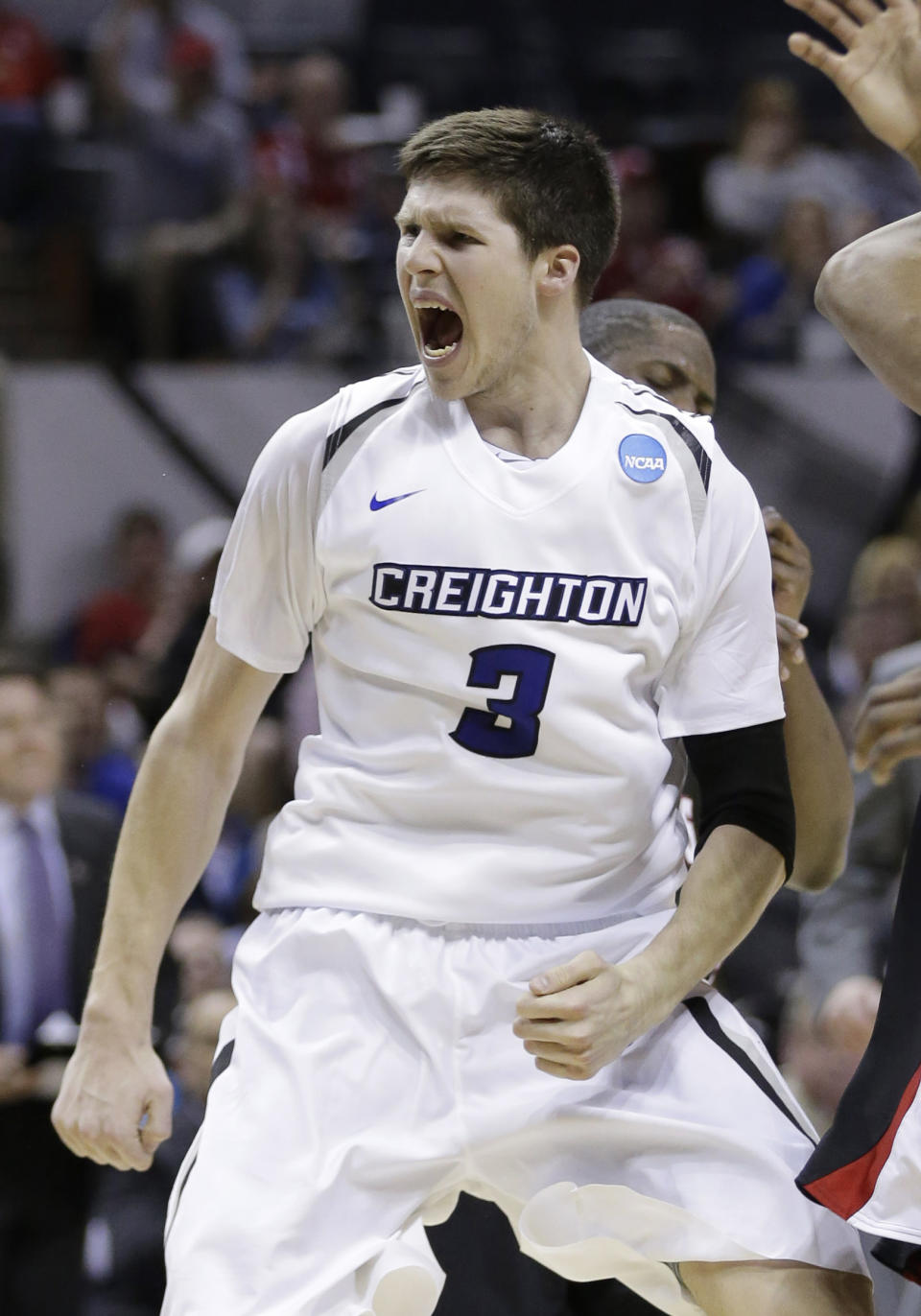 FILE - In this March 21, 2014 file photo, Creighton's Doug McDermott (3) celebrates a score against Louisiana-Lafayette during the second half of a second-round game in the NCAA college basketball tournament in San Antonio. McDermott was selected to The Associated Press All-America team, released Monday, March 31, 2014. (AP Photo/Eric Gay, File)