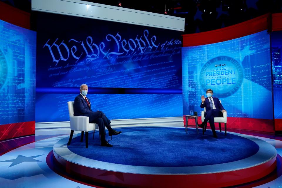 Democratic presidential candidate former Vice President Joe Biden looks to media as he arrives to participate in a town hall with moderator ABC News anchor George Stephanopoulos at the National Constitution Center in Philadelphia.