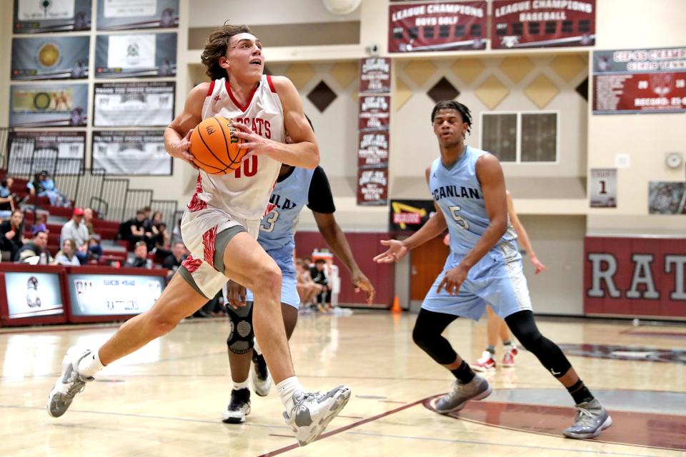 Miles Heide (40), a 6-foot-9 power forward from Mount Si High School in Washington drives to the basket against Monsignor Scanlon of New York during the Desert Holiday Classic in Rancho Mirage, Calif., on Tuesday, Dec. 27, 2022. 