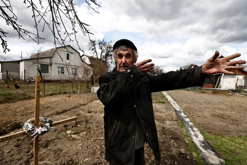 The Wider Image: Behind enemy lines, Ukrainian woman survives with her chickens