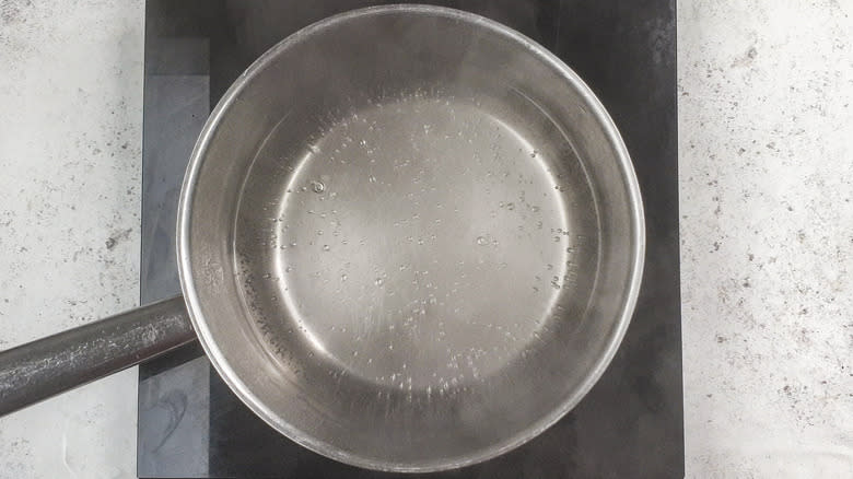 Boiling water in pan