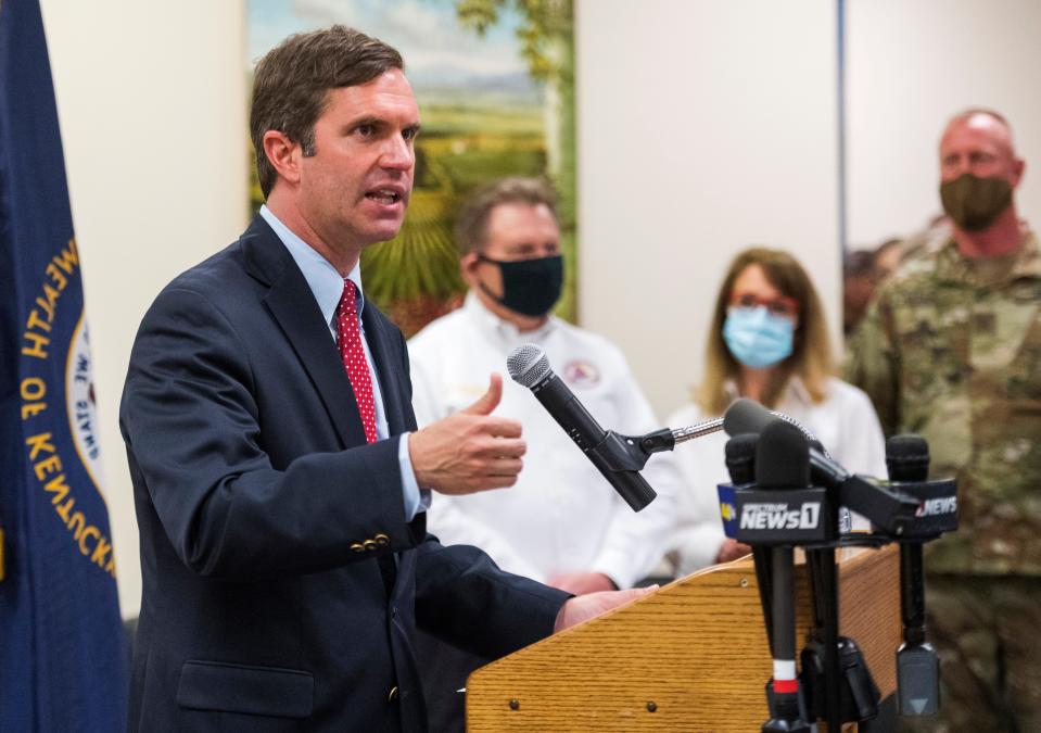 Kentucky Governor Andy Beshear addresses the crowd during the opening of a temporary federal vaccination clinic at the Henderson County Extension Office in Henderson, Ky., Wednesday afternoon, April 28, 2021. 
