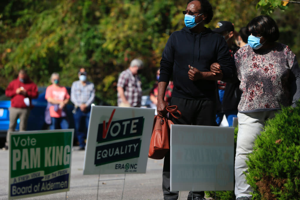 People Cast Ballots On First Day Of Early Voting In North Carolina