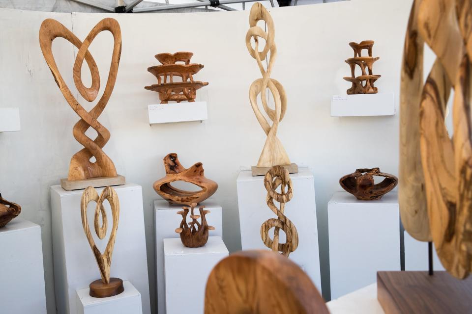 Jon Welborn's booth of carved wood at the Rockport Art Festival on Saturday, July 2, 2022.