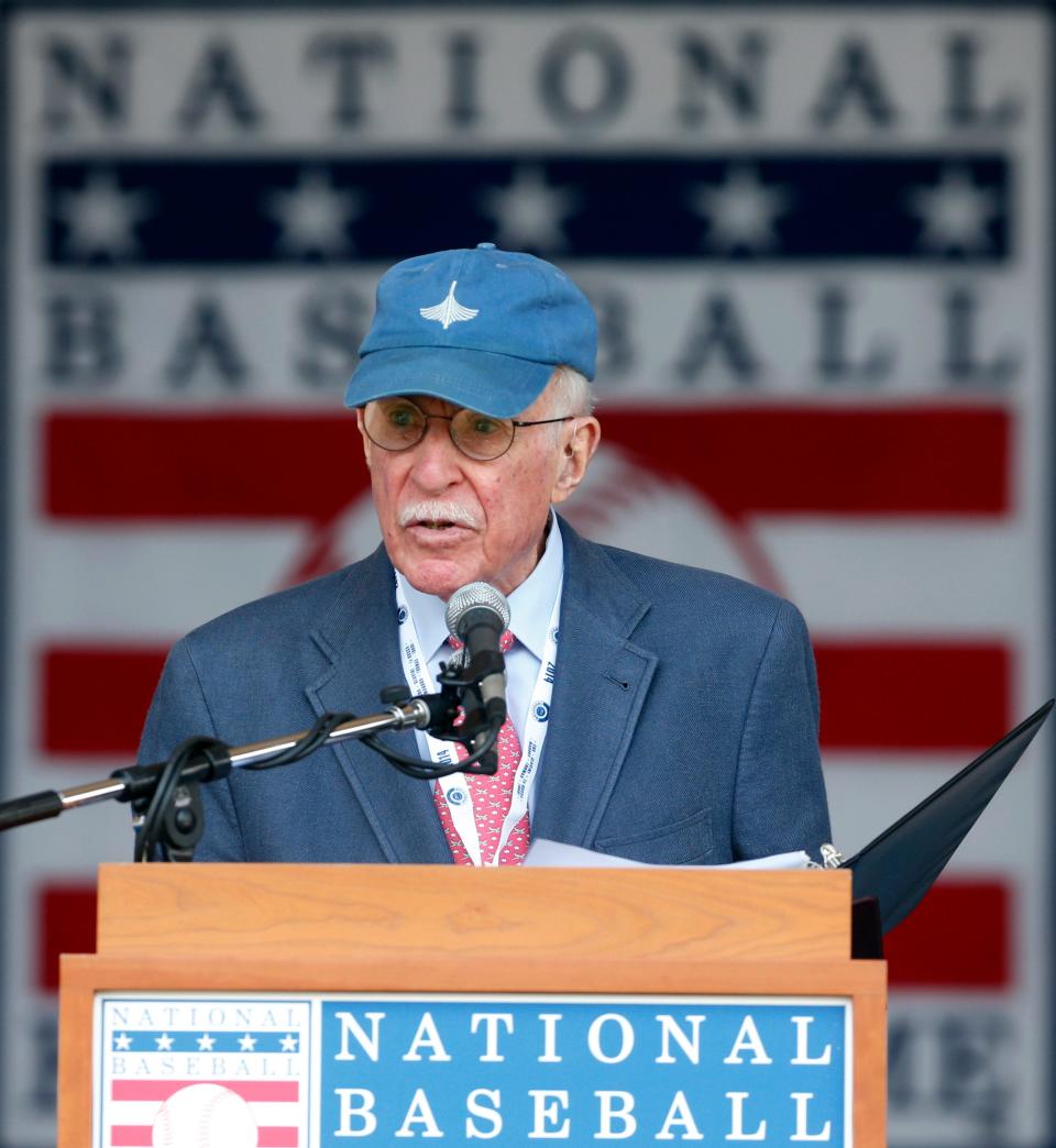 Roger Angell, of The New Yorker, speaks after receiving the J.G. Taylor Spink Award during a ceremony at Doubleday Field at the National Baseball Hall of Fame on July 26, 2014, in Cooperstown, New York. Angell died at 101 on May 20, 2022.
