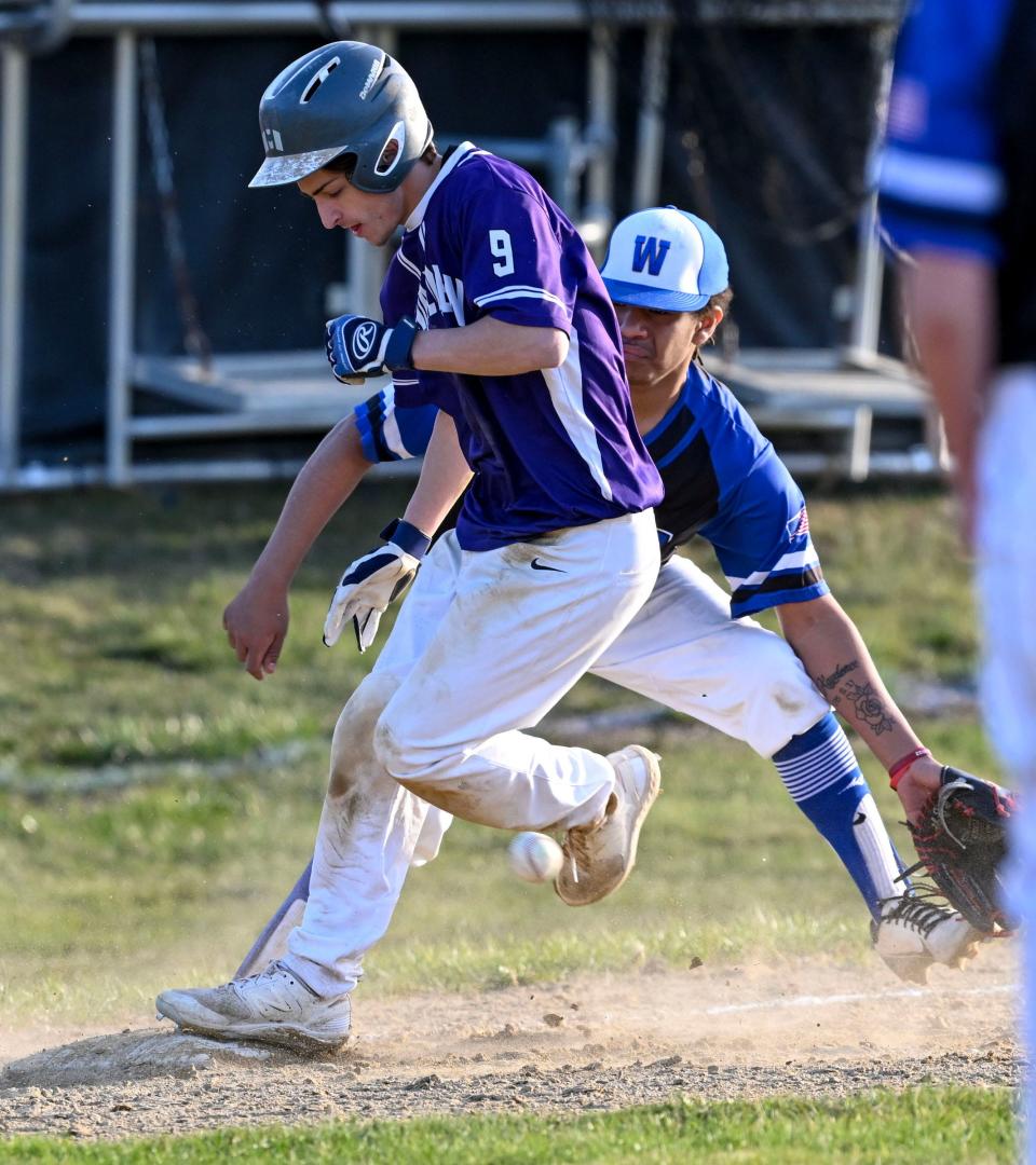 Ty Kelley of Bourne arrives at third ahead of the throw to Will Hesse of Wareham.