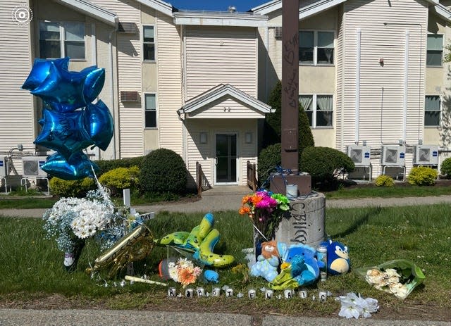 A shrine at the Leominster apartment complex where Robert Wright-Day was stabbed to death.