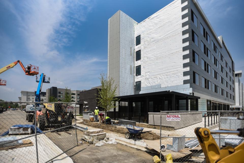 Workers seen Friday, June 30, 2023, at the Red Cedar Development site on the southeast side of the Marriott AC Hotel under construction. The lower level will house the upscale Italian restaurant Toscana.