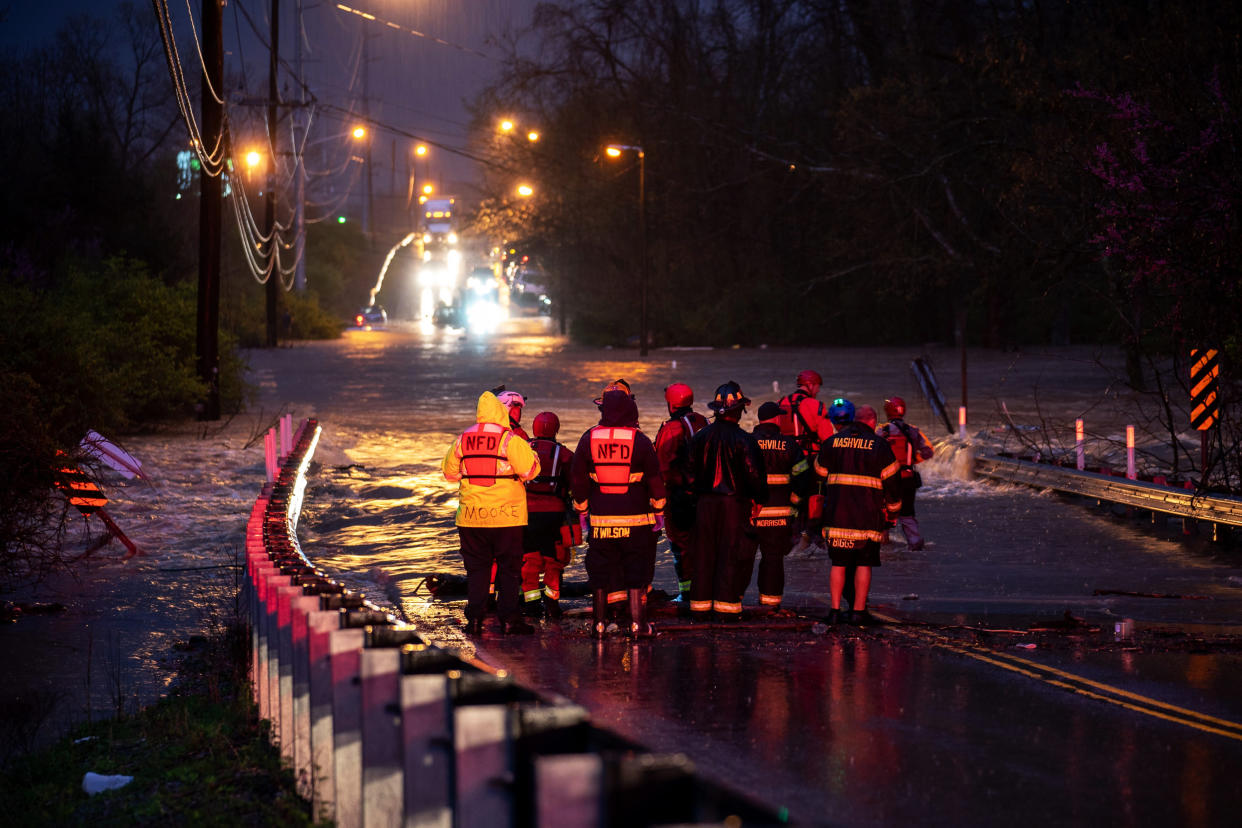 IMAGE: Emergency personnel stage for a call of people stranded in Nashville (Andrew Nelles / The Tennessean via USA TODAY Network)