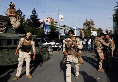 Afghan security forces leave the site of an attack on the Iraqi embassy in Kabul, Afghanistan July 31, 2017.REUTERS/Mohammad Ismail