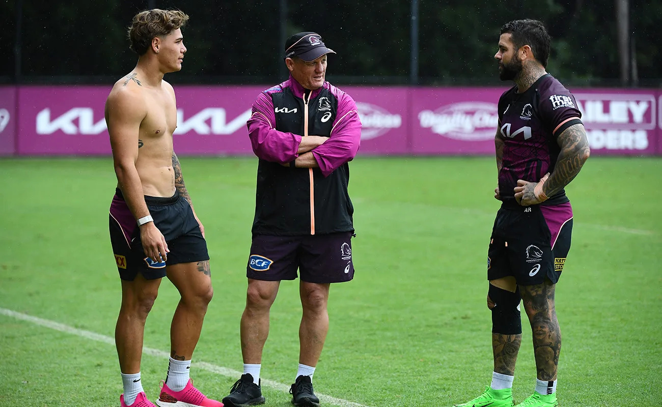 Reece Walsh, pictured here with Kevin Walters and Adam Reynolds at Broncos training.