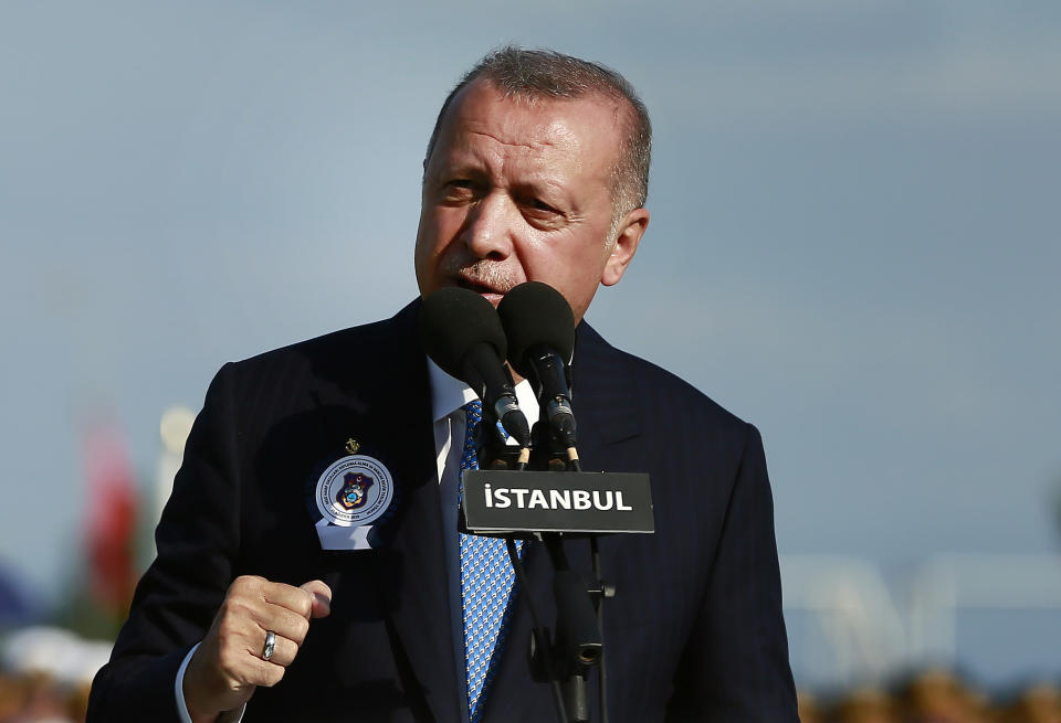 Turkey's President Recep Tayyip Erdogan delivers a speech to graduates of a military academy in Istanbul, Saturday, Aug. 31, 2019. Erdogan said the U.S. had up to three weeks to satisfy Turkish demands and has threatened to launch a unilateral offensive into northeastern Syria if plans to establish a so-called safe zone along Turkey's border fail to meet his expectations. Earlier this month, Turkish and U.S. officials agreed to set up the zone east of the Euphrates River. (Presidential Press Service via AP, Pool)