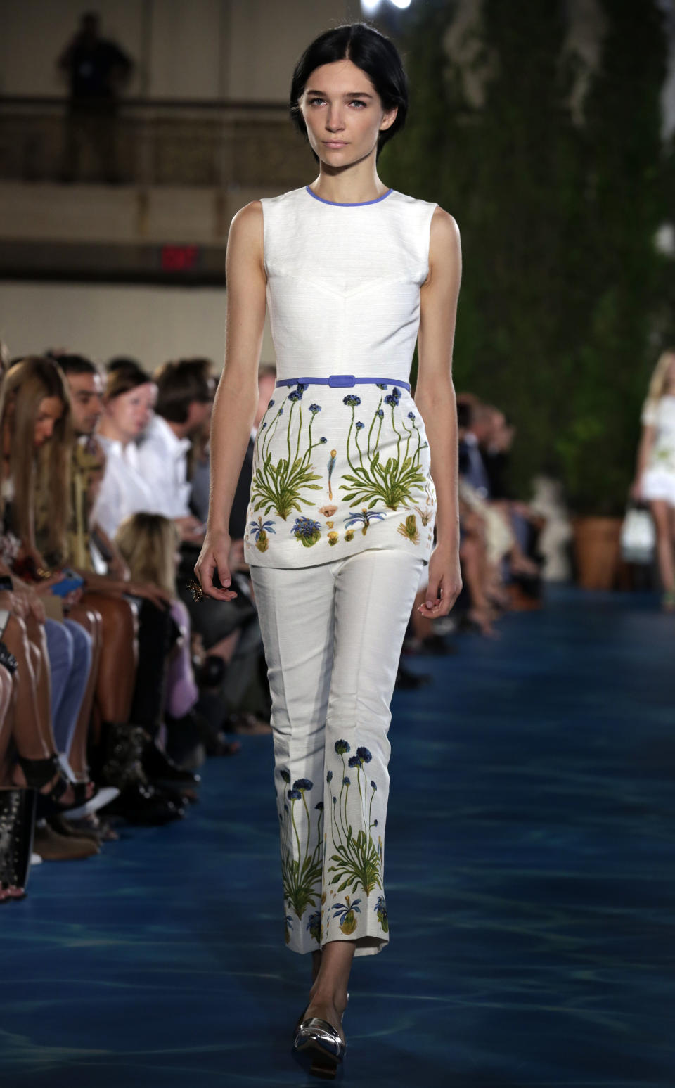 The Tory Burch Spring 2014 collection is modeled during Fashion Week in New York, Tuesday, Sept. 10, 2013. (AP Photo/Richard Drew)