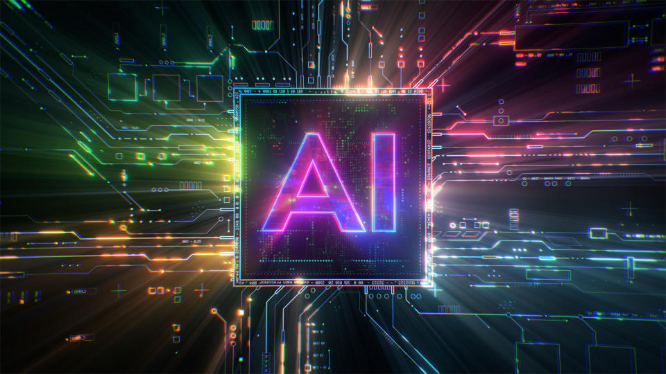 Flourescent letters AI centered above a multi-colored virtual circuit board.