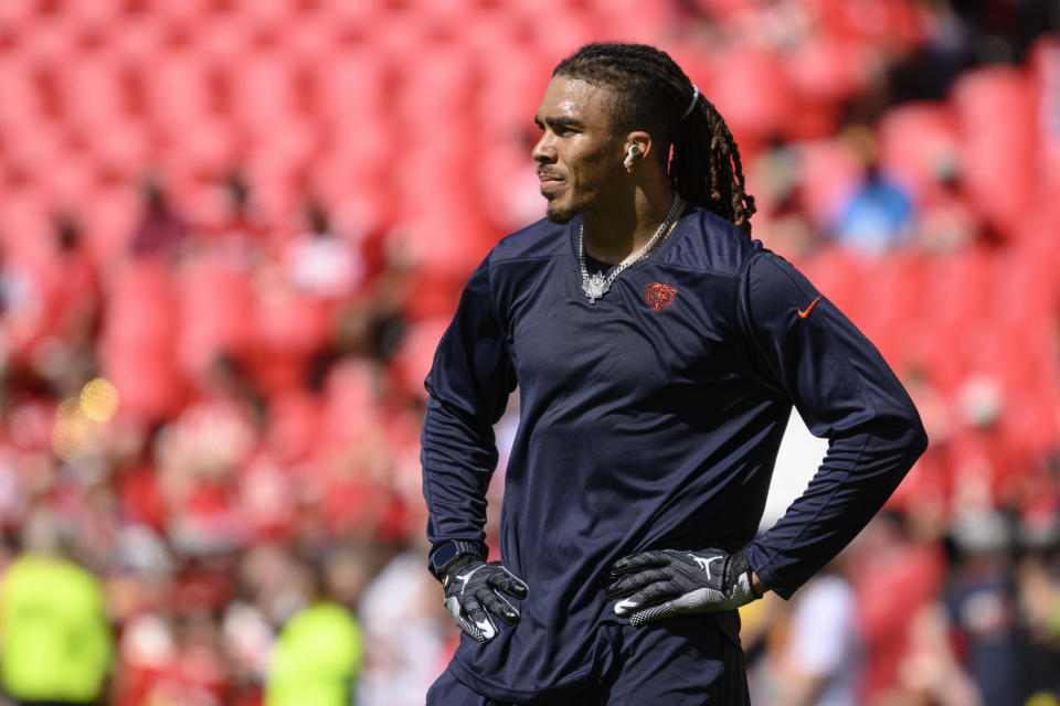 Chicago Bears wide receiver Chase Claypool takes a break during warmups before an NFL football game against the Kansas City Chiefs, Sunday, Sept. 24, 2023 in Kansas City, Mo. (AP Photo/Reed Hoffmann)