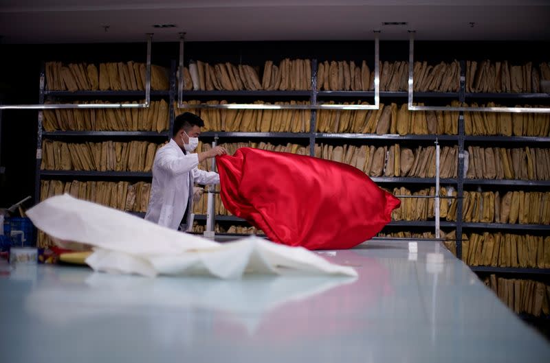 The Wider Image: Coronavirus dampens celebrations in China's wedding gown city