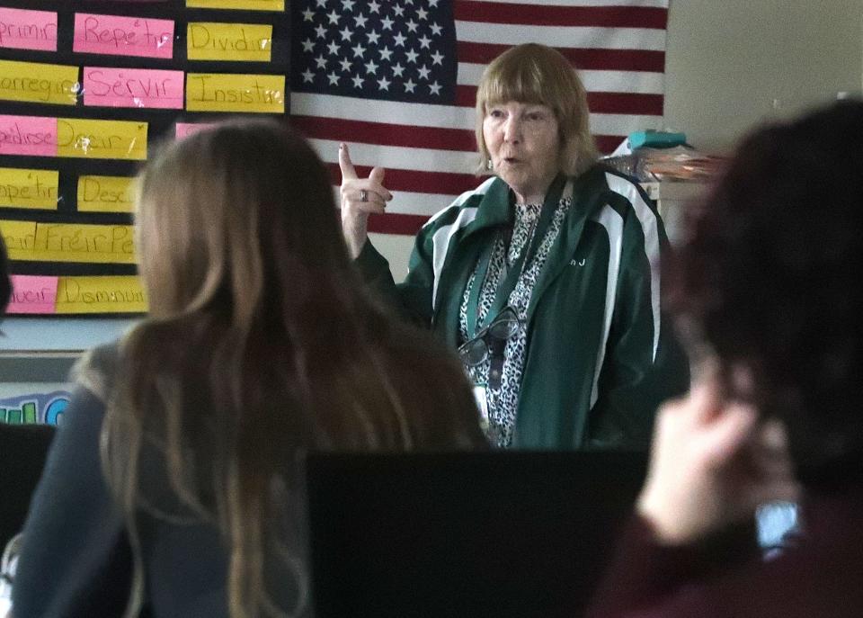 DeLand High School Spanish teacher Jeanne Jendrzejewski, gestures with her hand as she talks with students while they work on a lesson, Thursday, Jan. 25, 2023.