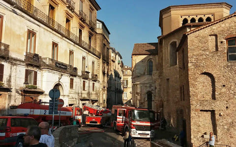 firefighters in the streets outside the library in Cosenza - Credit: Cosenza Library Press Office/ANSA