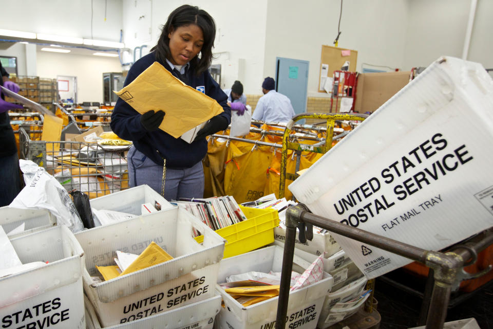 First-class mail has fallen in recent years, but the Postal Service has picked up a lot of business in parcel delivery due to online retail. (Photo: John Gress / Reuters)