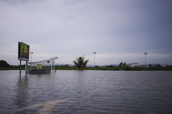 A road is flooded in Saint-Pierre, on the French Caribbean island of Martinique, after it was hit by Hurricane Maria, on September 19, 2017.