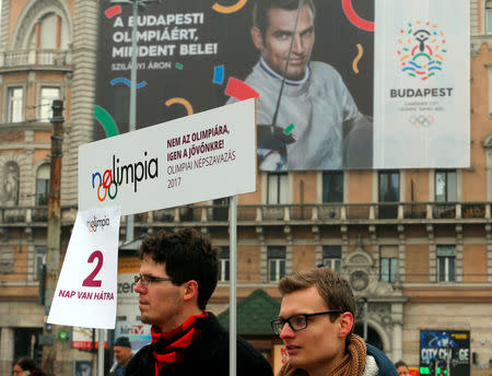 Activists of the opposition Momentum Movement collect signatures to force a referendum on the country's Olympic plans as Budapest bids for the 2024 Olympic Games, in central Budapest, Hungary, February 15, 2017. Picture taken February 15, 2017. REUTERS/Laszlo Balogh