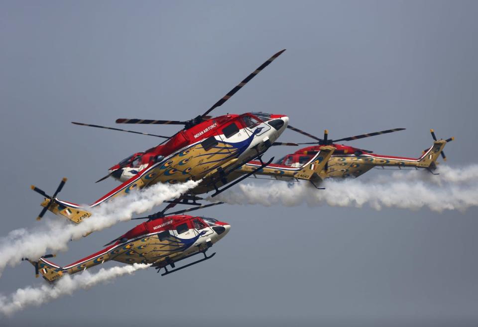 Indian Air Force “Sarang” helicopters perform during the full-dress rehearsal for Indian Air Force Day at the Hindon air force station on the outskirts of New Delhi October 6, 2015. The Indian Air Force will celebrate its 83rd anniversary on October 8. REUTERS/Anindito Mukherjee