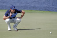 Rory McIlroy, of Northern Ireland, lines up a shot on the sixth green during the second round of the Arnold Palmer Invitational golf tournament Friday, March 6, 2020, in Orlando, Fla. (AP Photo/John Raoux)