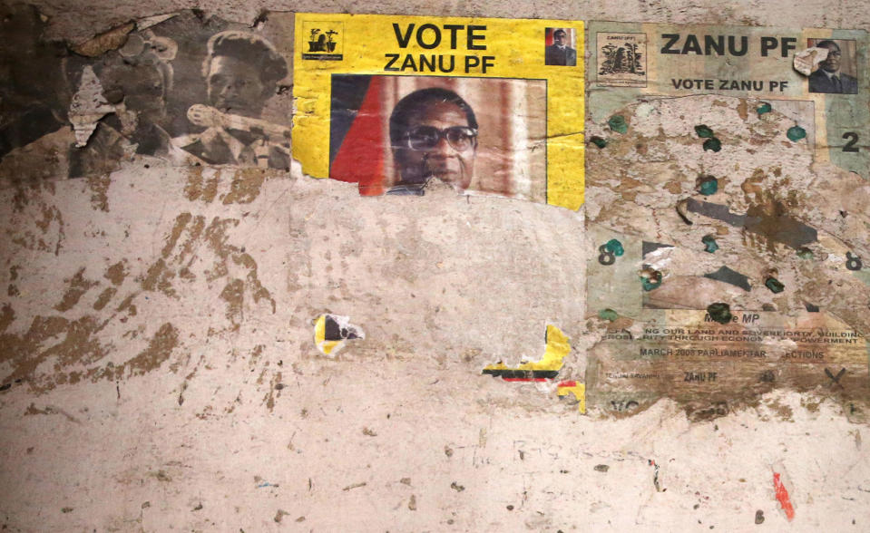 <p>An election poster from the 2008 ZANU-PF election campaign on the wall of a dilapidated building in the Mbara suburb of Harare, Nov. 17, 2017. (Photo: AP) </p>
