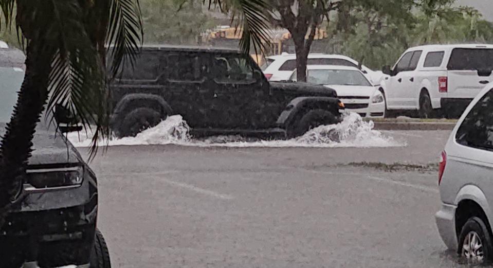 Flash flooding in the parking lot of Sarasota's YMCA Branch located at 1075 S Euclid Ave., Tuesday afternoon, June 11, 2024.